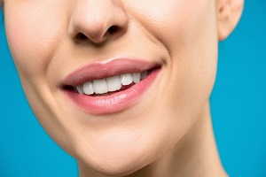 woman with pink lips smiliing Hawksburn Village Dental - Dentist Dr. John Pohl